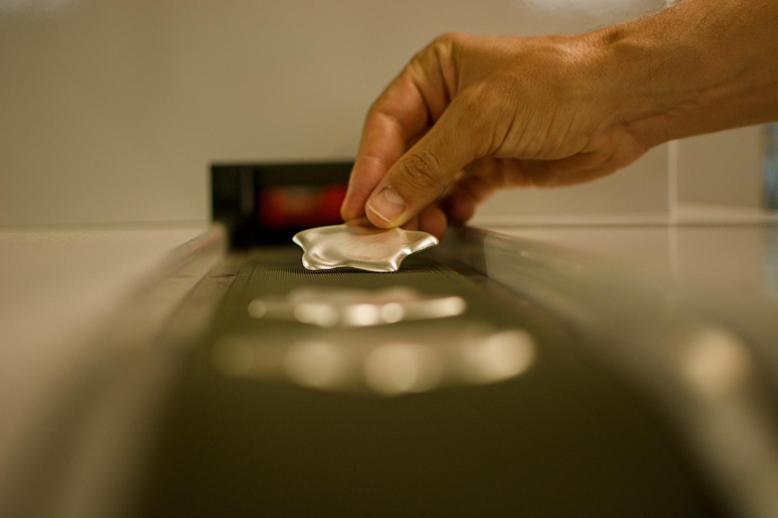 Master jeweller inspecting a diamond setting — Casting welding