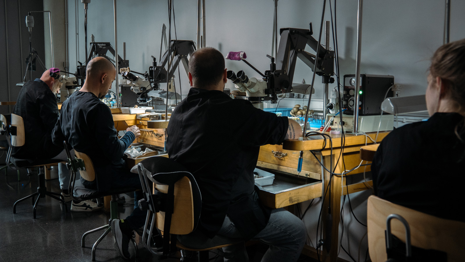 Master jeweller inspecting a diamond setting — Stone setting