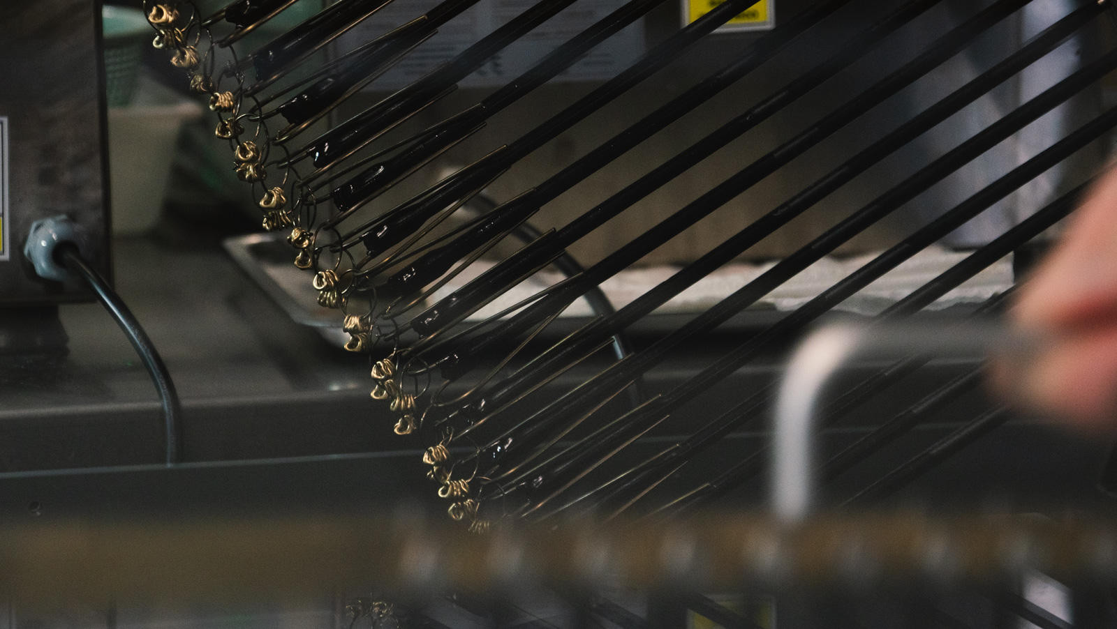 Close-up of a polished precious-metal jewellery surface
